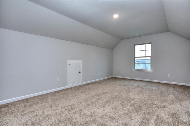 96 Sherwood Dr, Commerce, GA 30529 - bonus room featuring vaulted ceiling, carpet, visible vents, and baseboards