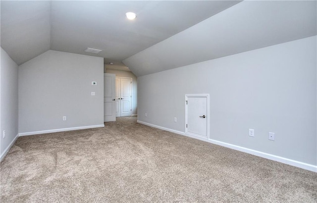 96 Sherwood Dr, Commerce, GA 30529 - bonus room with vaulted ceiling, carpet flooring, and baseboards