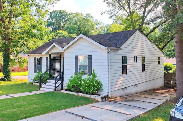 3143 Church St, East Point, GA 30344 - view of front of house featuring a front yard, crawl space, and a shingled roof