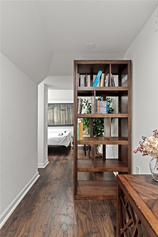3143 Church St, East Point, GA 30344 - bedroom featuring wood finished floors and lofted ceiling