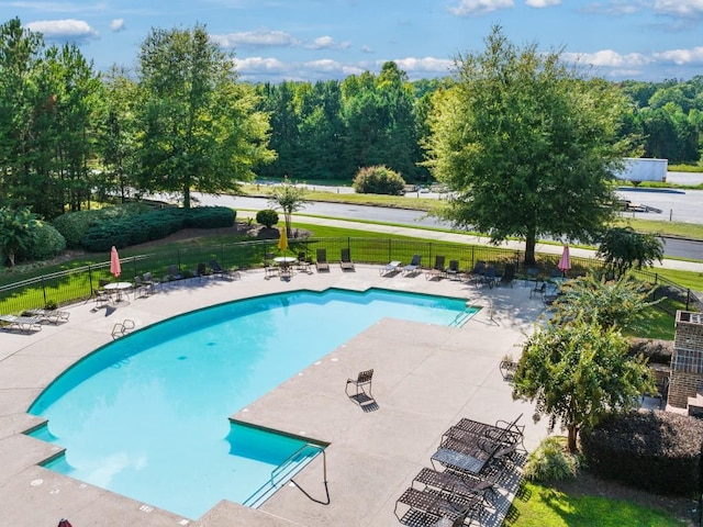 view of pool featuring a patio