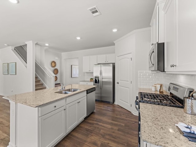 kitchen featuring white cabinetry, sink, and stainless steel appliances