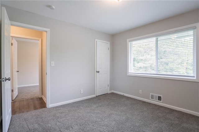 5795 Deerfield Trl, Atlanta, GA 30349 - spare room with carpet flooring and baseboards