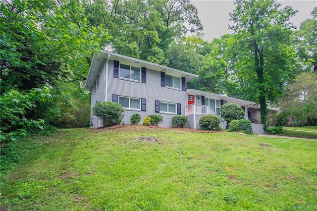 5795 Deerfield Trl, Atlanta, GA 30349 - split level home featuring a front yard