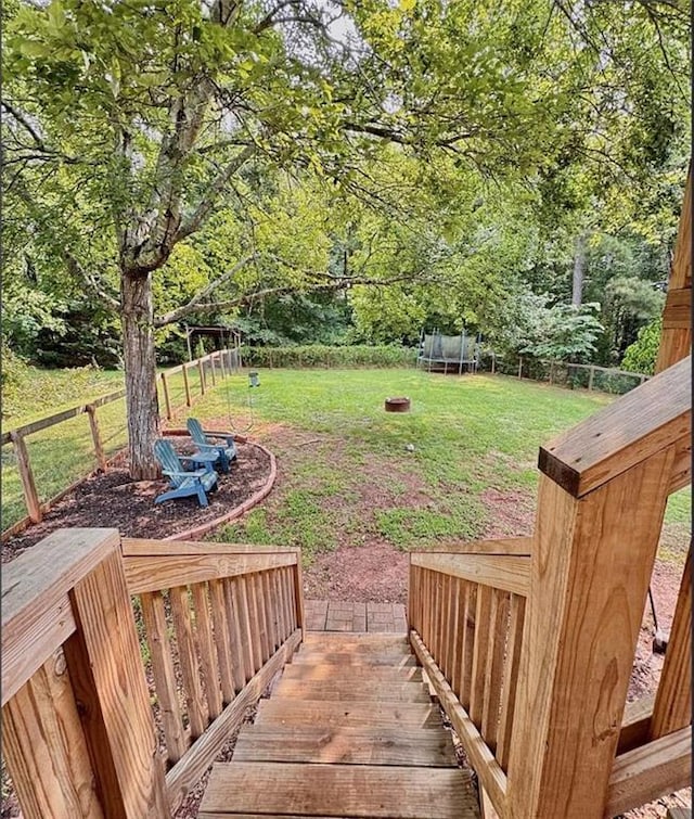 5624 Ryan Way, Flowery Branch, GA 30542 - view of yard with a trampoline
