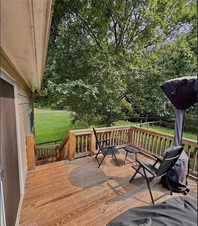 5624 Ryan Way, Flowery Branch, GA 30542 - wooden deck with a yard