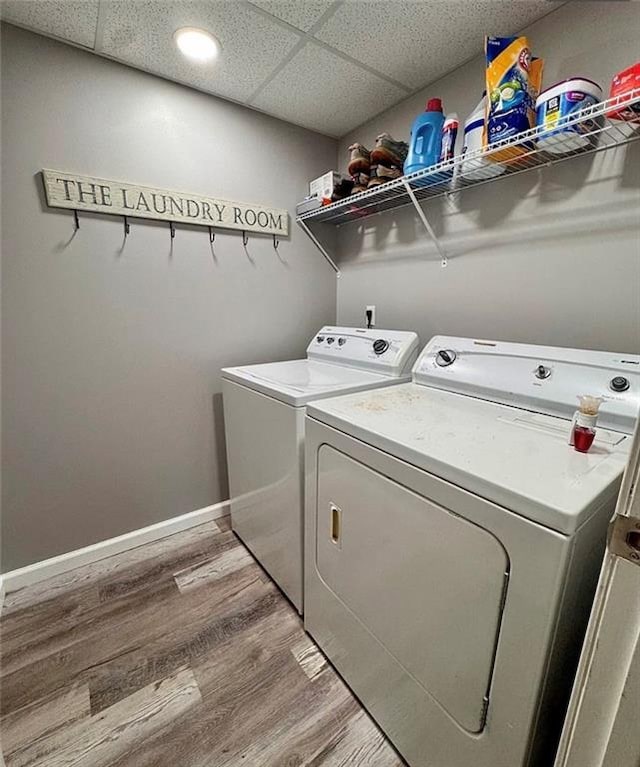 5624 Ryan Way, Flowery Branch, GA 30542 - laundry area featuring independent washer and dryer and light wood-type flooring