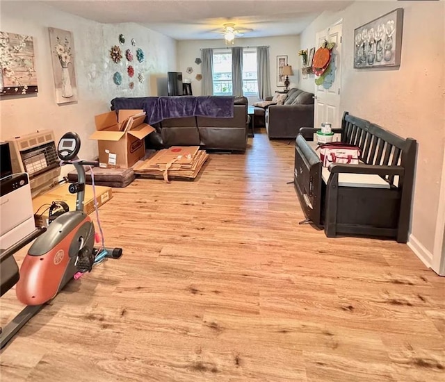 5624 Ryan Way, Flowery Branch, GA 30542 - living area featuring wood finished floors and ceiling fan
