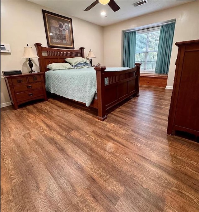 5624 Ryan Way, Flowery Branch, GA 30542 - bedroom featuring wood finished floors and a ceiling fan