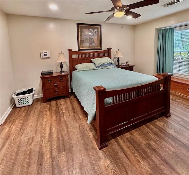 5624 Ryan Way, Flowery Branch, GA 30542 - bedroom featuring wood finished floors and a ceiling fan