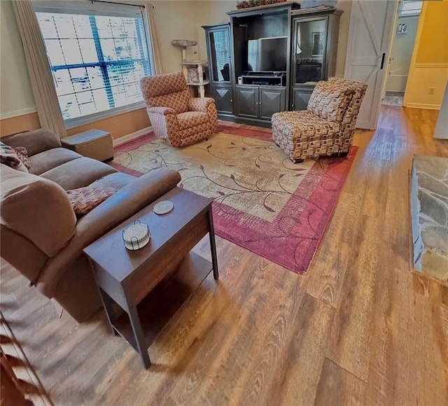 5624 Ryan Way, Flowery Branch, GA 30542 - living room with wood finished floors and baseboards