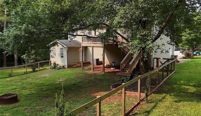 5624 Ryan Way, Flowery Branch, GA 30542 - rear view of house with stairs and a wooden deck