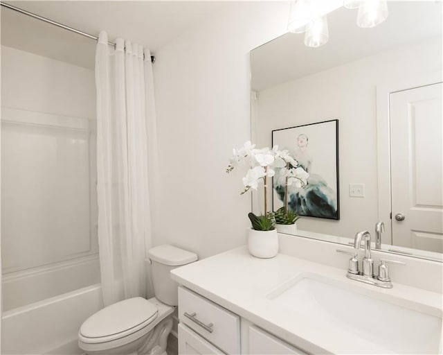 full bathroom featuring vanity, shower / tub combo with curtain, and toilet