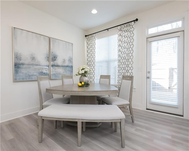 dining space featuring light hardwood / wood-style flooring