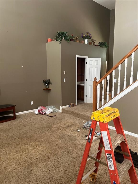 50 Ranger Rd SE, Cartersville, GA 30121 - carpeted foyer entrance with baseboards and stairs
