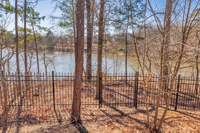 view of water feature with fence