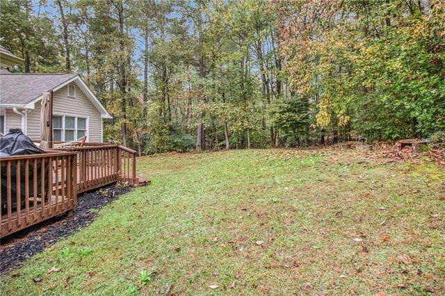 view of yard with a deck