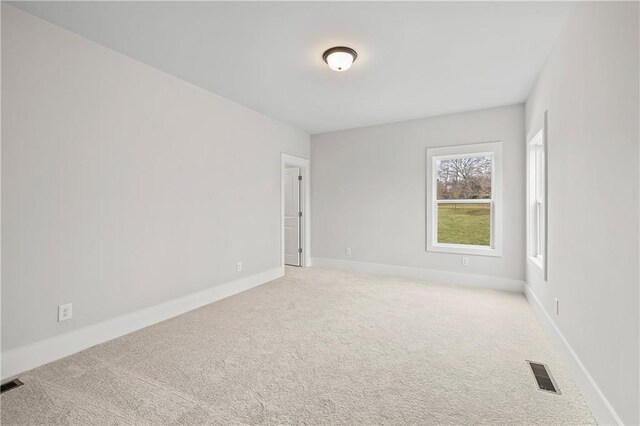 171 Blue Rider Trl, Hoschton, GA 30548 - carpeted empty room with baseboards and visible vents