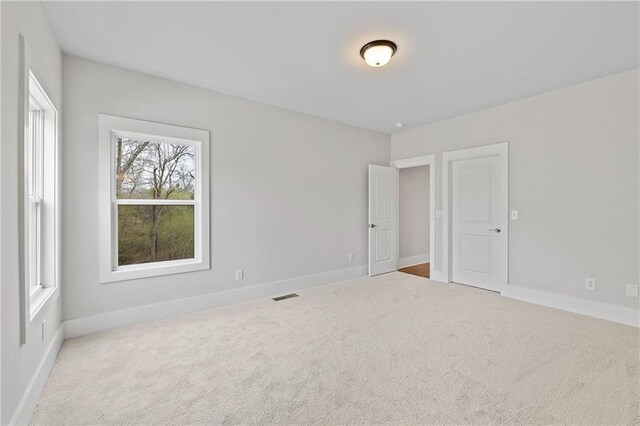 171 Blue Rider Trl, Hoschton, GA 30548 - carpeted empty room featuring baseboards and visible vents