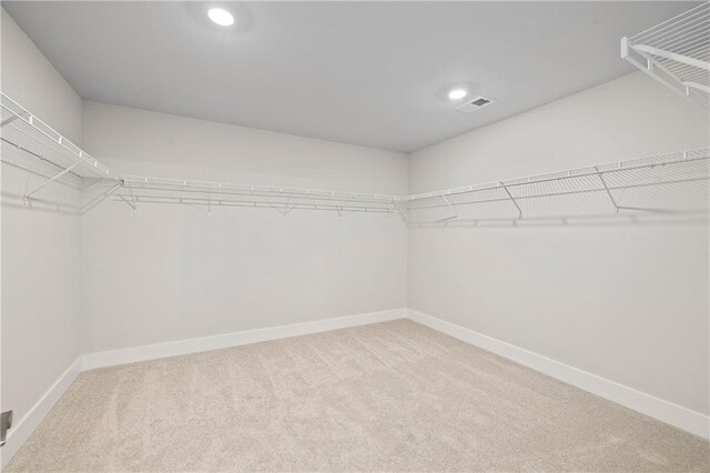 171 Blue Rider Trl, Hoschton, GA 30548 - spacious closet featuring carpet floors and visible vents