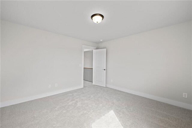 171 Blue Rider Trl, Hoschton, GA 30548 - carpeted empty room with baseboards
