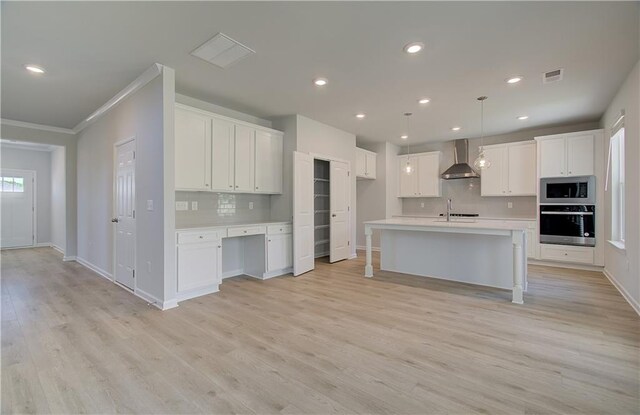 237 Chiswick Loop, Stockbridge, GA 30281 - kitchen with light countertops, baseboards, backsplash, wall chimney exhaust hood, and appliances with stainless steel finishes