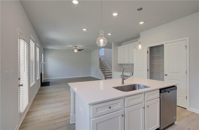 237 Chiswick Loop, Stockbridge, GA 30281 - kitchen featuring dishwasher, a ceiling fan, baseboards, and a sink