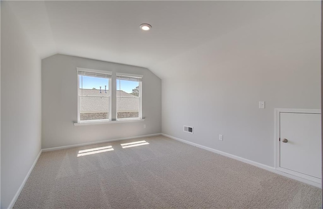 237 Chiswick Loop, Stockbridge, GA 30281 - bonus room with baseboards, visible vents, carpet, recessed lighting, and lofted ceiling
