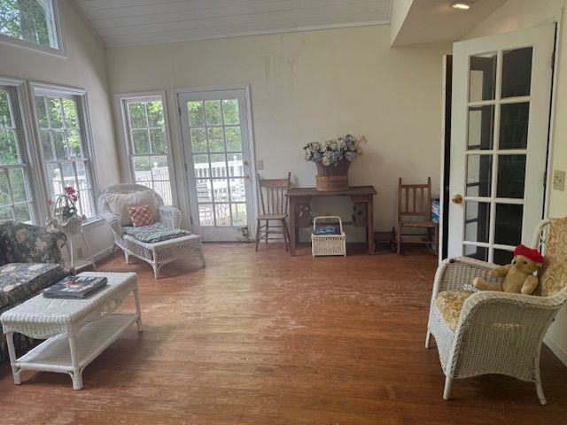 408 Hasty Trl, Canton, GA 30115 - sunroom / solarium featuring french doors, healthy amount of natural light, and vaulted ceiling