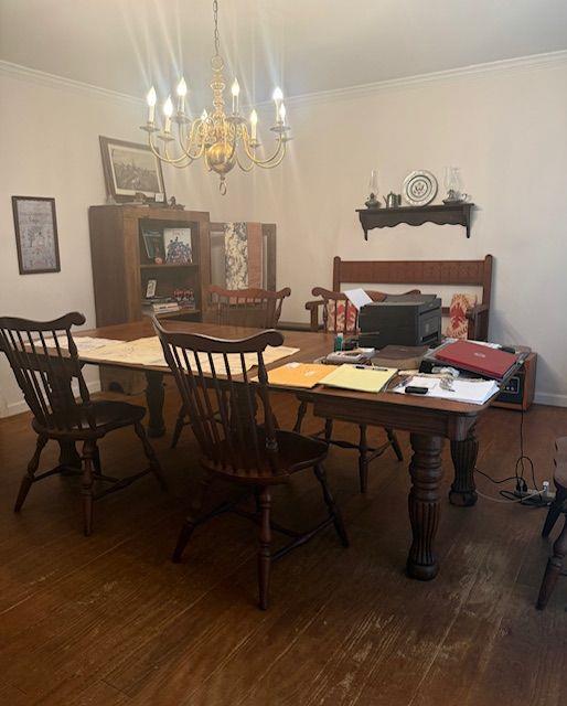 408 Hasty Trl, Canton, GA 30115 - dining room with a chandelier, wood-type flooring, and crown molding