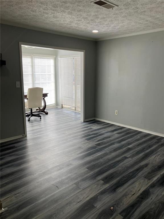 unfurnished office featuring dark hardwood / wood-style flooring and a textured ceiling