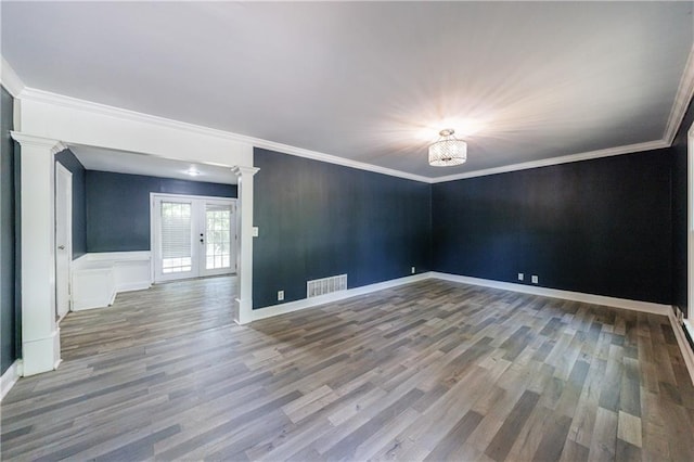 5287 Chantilly Ter, Atlanta, GA 30349 - spare room featuring french doors, visible vents, ornamental molding, and wood finished floors