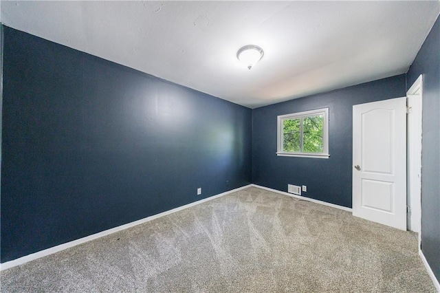 5287 Chantilly Ter, Atlanta, GA 30349 - unfurnished room featuring carpet flooring, baseboards, and visible vents
