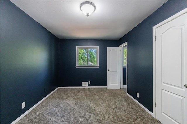 5287 Chantilly Ter, Atlanta, GA 30349 - unfurnished bedroom with carpet flooring, visible vents, and baseboards