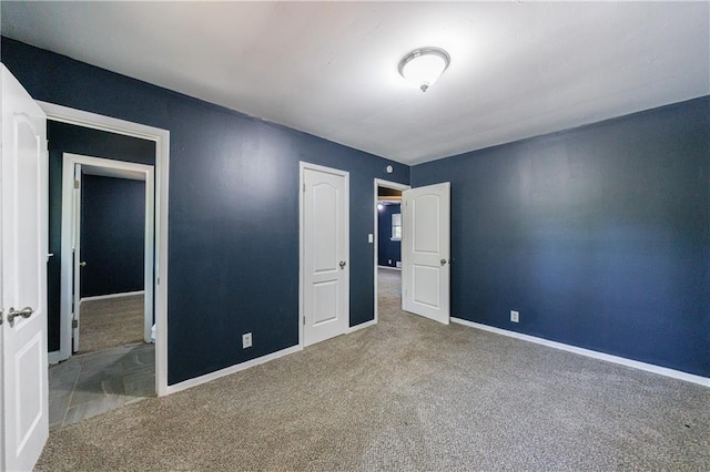 5287 Chantilly Ter, Atlanta, GA 30349 - unfurnished bedroom featuring baseboards and carpet flooring