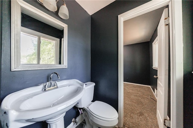 5287 Chantilly Ter, Atlanta, GA 30349 - half bath with a sink, baseboards, and toilet