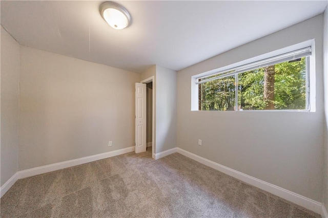 5287 Chantilly Ter, Atlanta, GA 30349 - unfurnished bedroom with carpet and baseboards