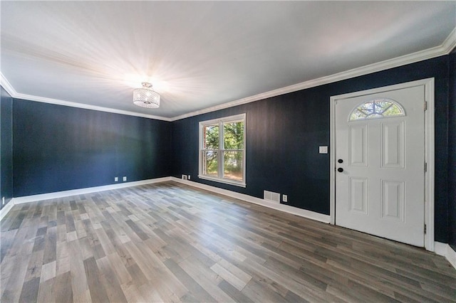 5287 Chantilly Ter, Atlanta, GA 30349 - entryway featuring visible vents, baseboards, ornamental molding, and wood finished floors