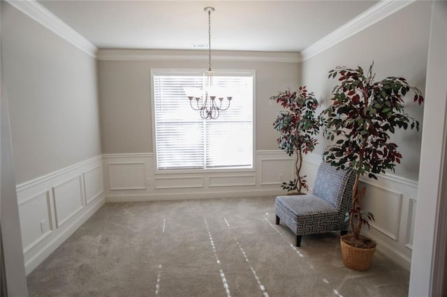 sitting room with carpet, a chandelier, and a decorative wall