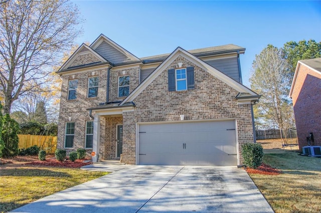 craftsman-style house featuring a garage, concrete driveway, brick siding, and fence