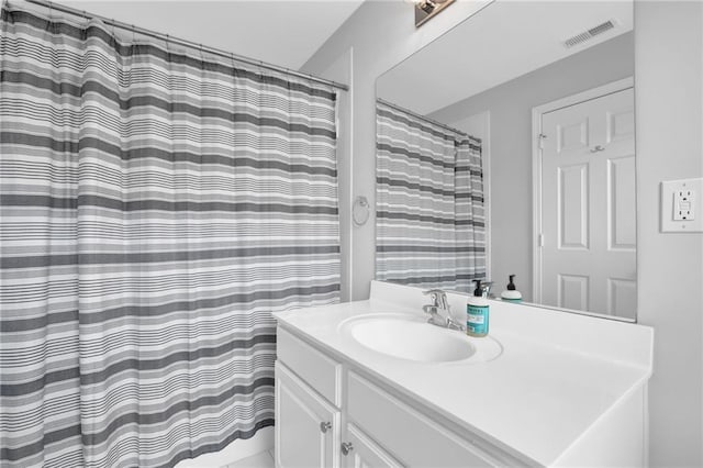 2207 Concordia Way SE Unit 12, Mableton, GA 30126 - full bath featuring vanity and a shower with curtain