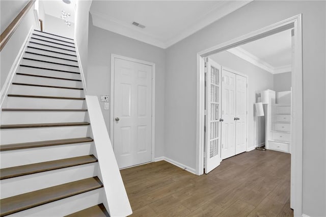 2207 Concordia Way SE Unit 12, Mableton, GA 30126 - stairs featuring crown molding, wood finished floors, and baseboards