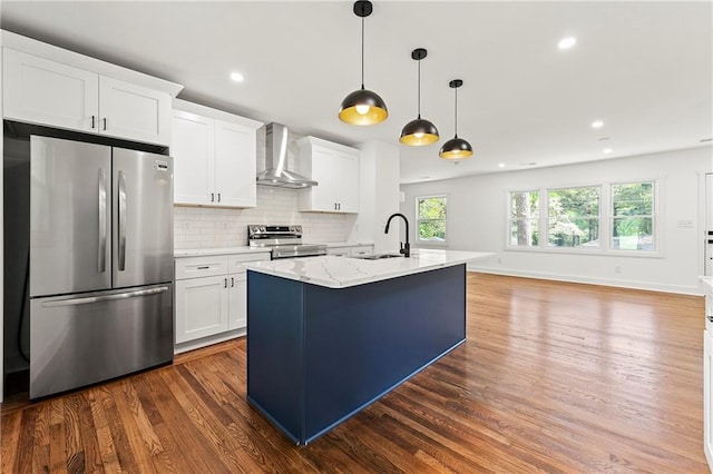 2146 Trailwood Rd, Decatur, GA 30032 - kitchen featuring wall chimney exhaust hood, stainless steel appliances, a sink, white cabinetry, and dark wood-type flooring