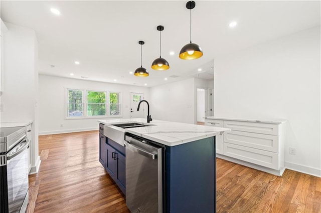 2146 Trailwood Rd, Decatur, GA 30032 - kitchen with light wood-style floors, light stone countertops, stainless steel appliances, and a sink
