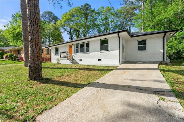 2146 Trailwood Rd, Decatur, GA 30032 - ranch-style home featuring crawl space, a front lawn, driveway, and brick siding