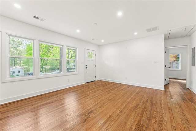 2146 Trailwood Rd, Decatur, GA 30032 - empty room with attic access, wood finished floors, visible vents, and recessed lighting