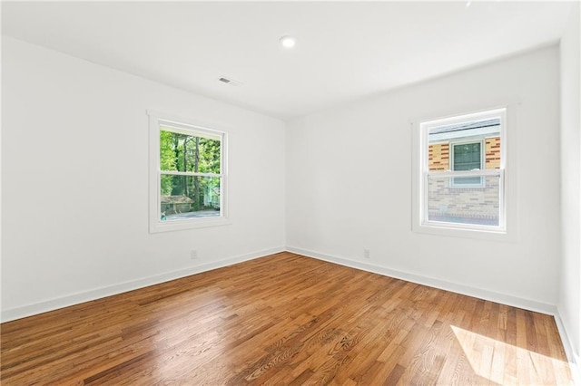 2146 Trailwood Rd, Decatur, GA 30032 - unfurnished room featuring recessed lighting, baseboards, and light wood-style flooring