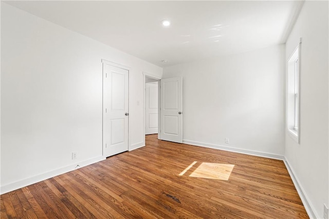 2146 Trailwood Rd, Decatur, GA 30032 - empty room with recessed lighting, wood finished floors, and baseboards