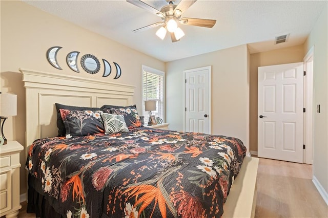 15 Fairwoods Ct, Covington, GA 30016 - bedroom with light wood-type flooring and ceiling fan