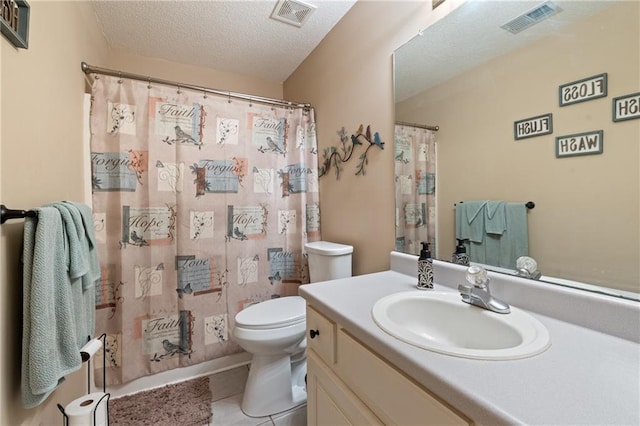 15 Fairwoods Ct, Covington, GA 30016 - bathroom featuring tile patterned flooring, vanity, a shower with curtain, and a textured ceiling
